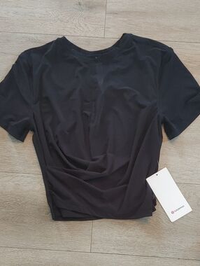 lululemon athletica Women's Black Mesh Rushed l Yoga Top In Size 4